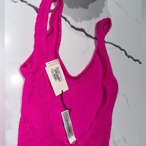 Beautiful neon pink bond-eye one piece with tags on.  Fits sizes 0-8